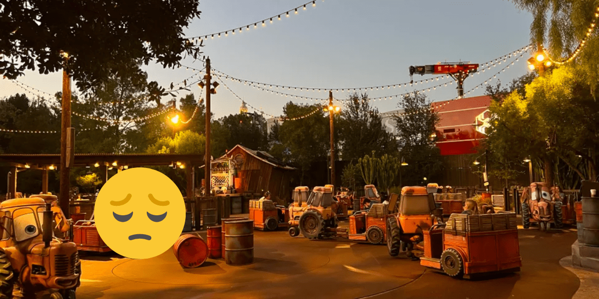 Web Slingers visible from Cars Land - a sad emoji is added over the photo.