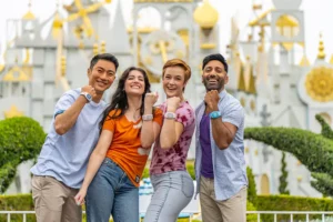 Adult Guests wearing MagicBand+ at Disneyland Resort