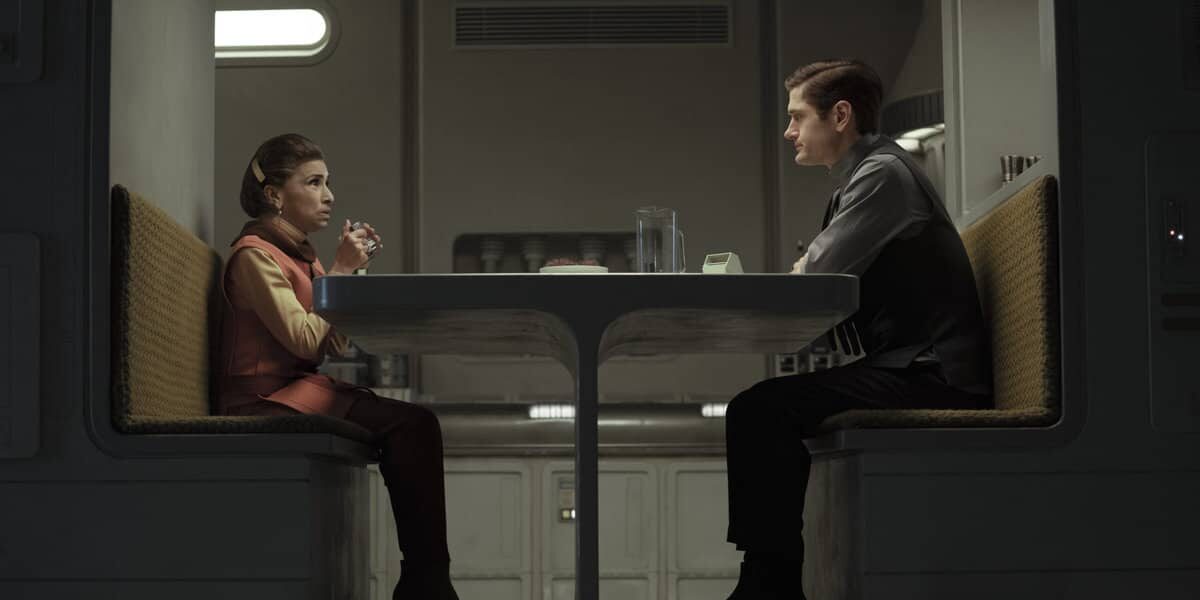 (L-R): Eedy Karn (Kathryn Hunter) and Syril Karn (Kyle Soller) in Lucasfilm's ANDOR, exclusively on Disney+. ©2022 Lucasfilm Ltd. & TM. All Rights Reserved.