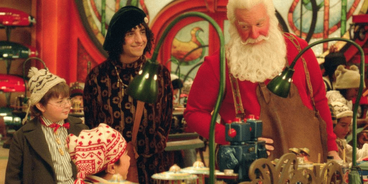 Santa and elves in workshop