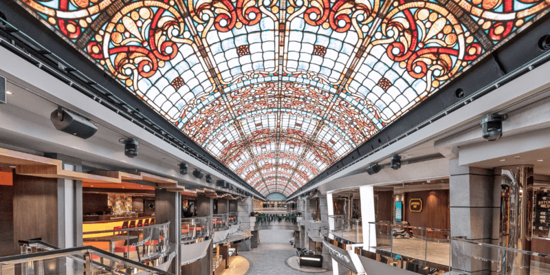 An interior shot of the Meraviglia, with a red stained glass roof.
