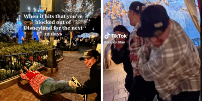 One passholder lays on the ground while another is dragged out from the park by friends.