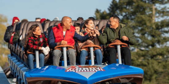 Guests riding Candymonium at Hersheypark, the theme park roller coaster