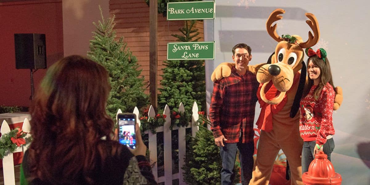 d23 light up the season photo with pluto