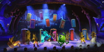Mike, Sulley, Boo and agents of the CDA from Monsters Inc. on stage at Disneyland Paris