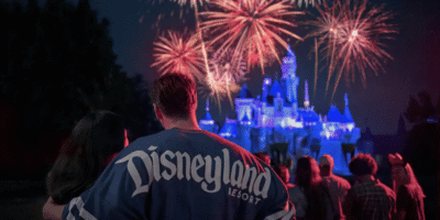 Two guests watch the fireworks at Disneyland.