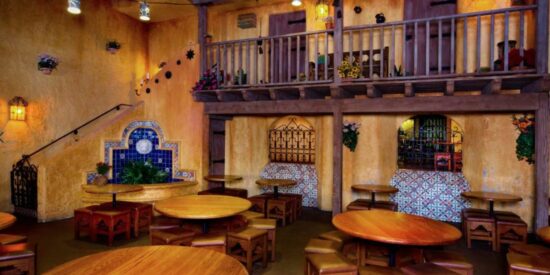 Pecos Bill Tall Tale Inn interior, with multiple empty tables 