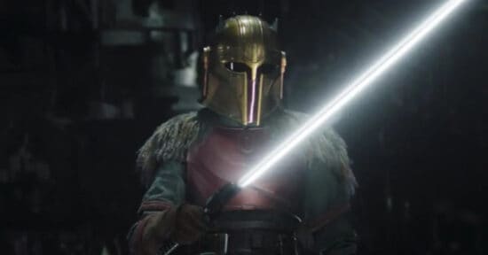 Emily Swallow as The Armorer holding the Darksaber