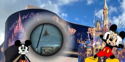 A billboard with the 50th year sign taken down, Mickey Mouse with a shocked and sad expression.