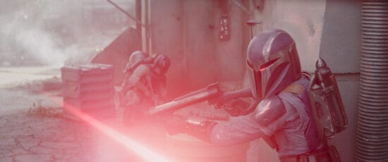 Covert Mandalorians in a scene from Lucasfilm's THE MANDALORIAN, season three, exclusively on Disney+. ©2023 Lucasfilm Ltd. & TM. All Rights Reserved.