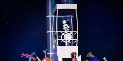 Mickey drives the boat in Fantasmic!