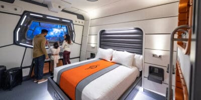 Guests look out the window on Galactic Starcruiser.
