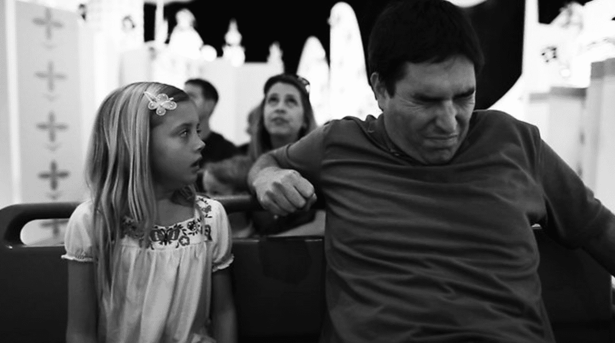 Two characters on it's a small world in Escape From Tomorrow