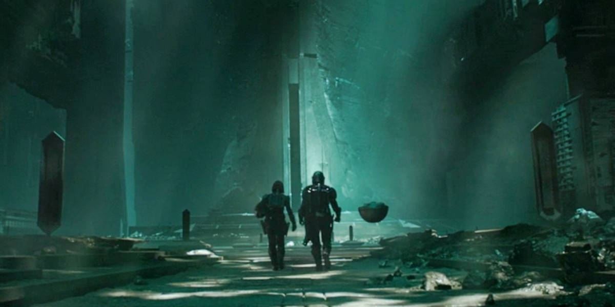Bo-Katan (Katee Sackhoff) and Din Djarin (Pedro Pascal) alongside Grogu on Mandalore