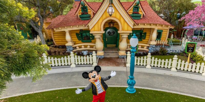 Mickey poses in front of his house in Toontown