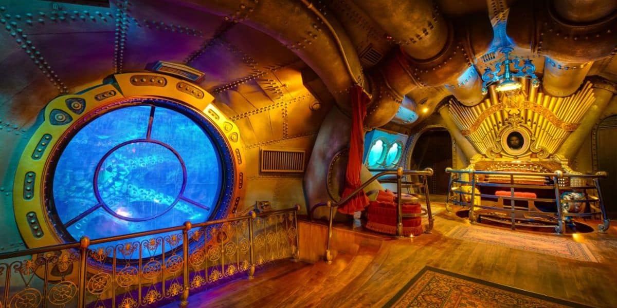 A squid looks through the window of the Nautilus