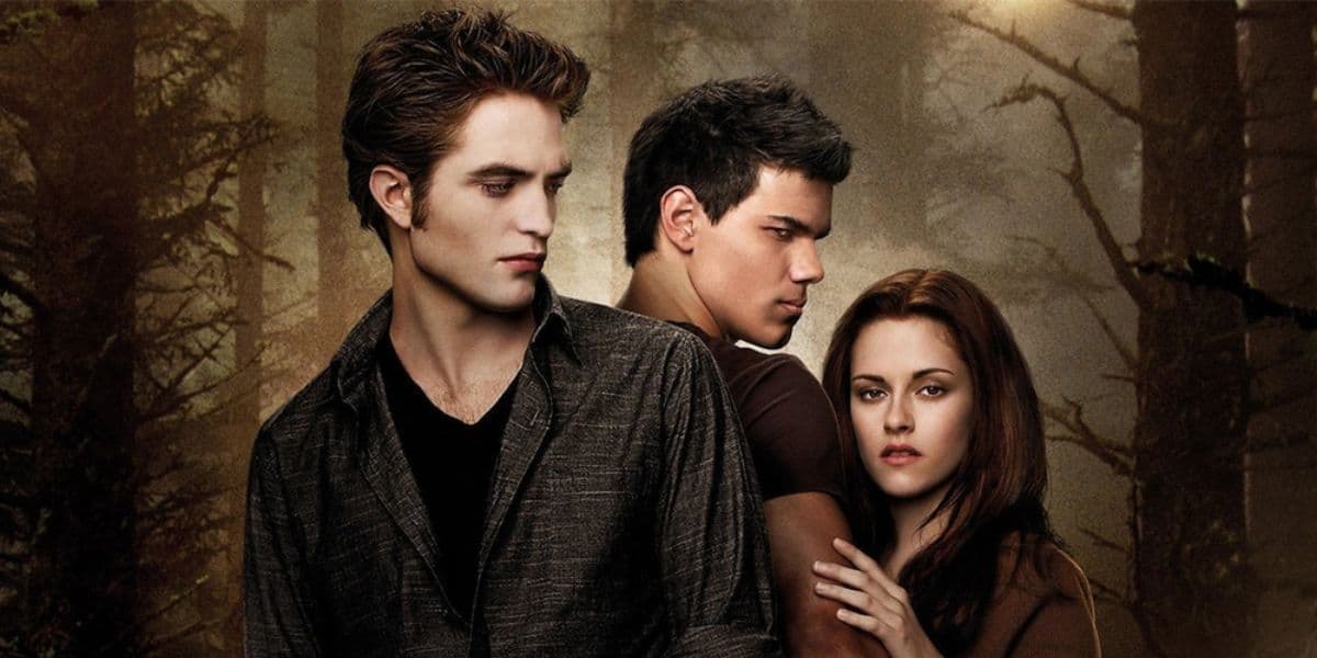 Bella hides behind Jacob and Edward
