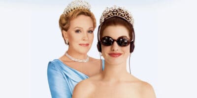 Julie Andrews standing behind Anne Hathaway in Princess Diaries poster