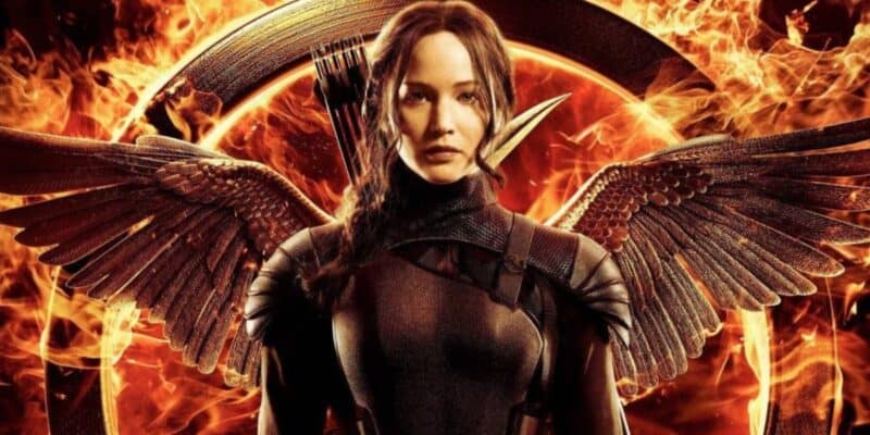 Jennifer Lawrence as Katniss Everdeen on a fiery background with wings in Hunger Games