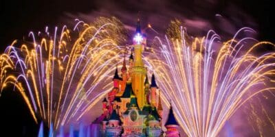 Disney Dreams! lights up the sky with fireworks behind Sleeping Beauty Castle