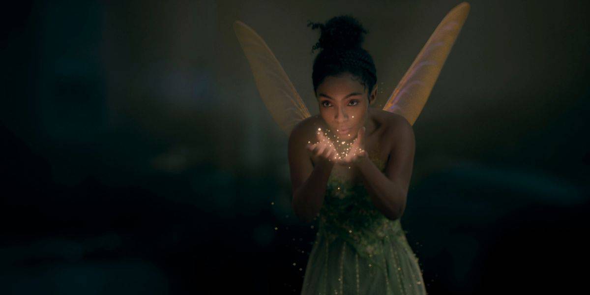 Tinker Bell blows Pixie Dust