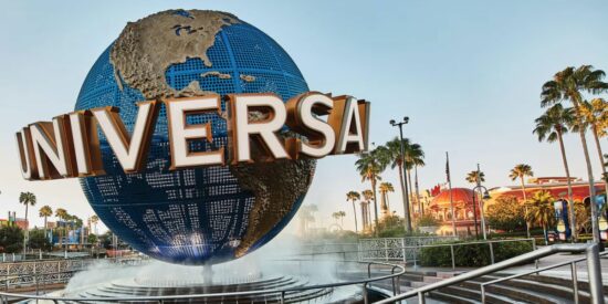 Universal globe with smoke around it at Universal Florida entrance