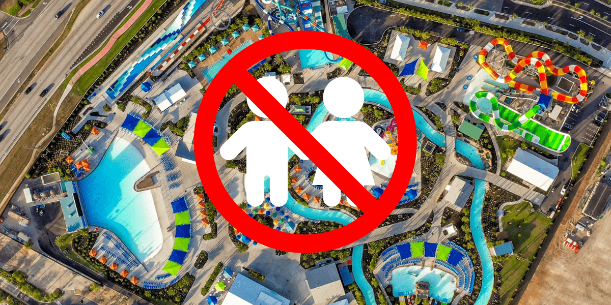 An overview of an Orlando Water Park, Island H2O, with a sign intended to keep out children.