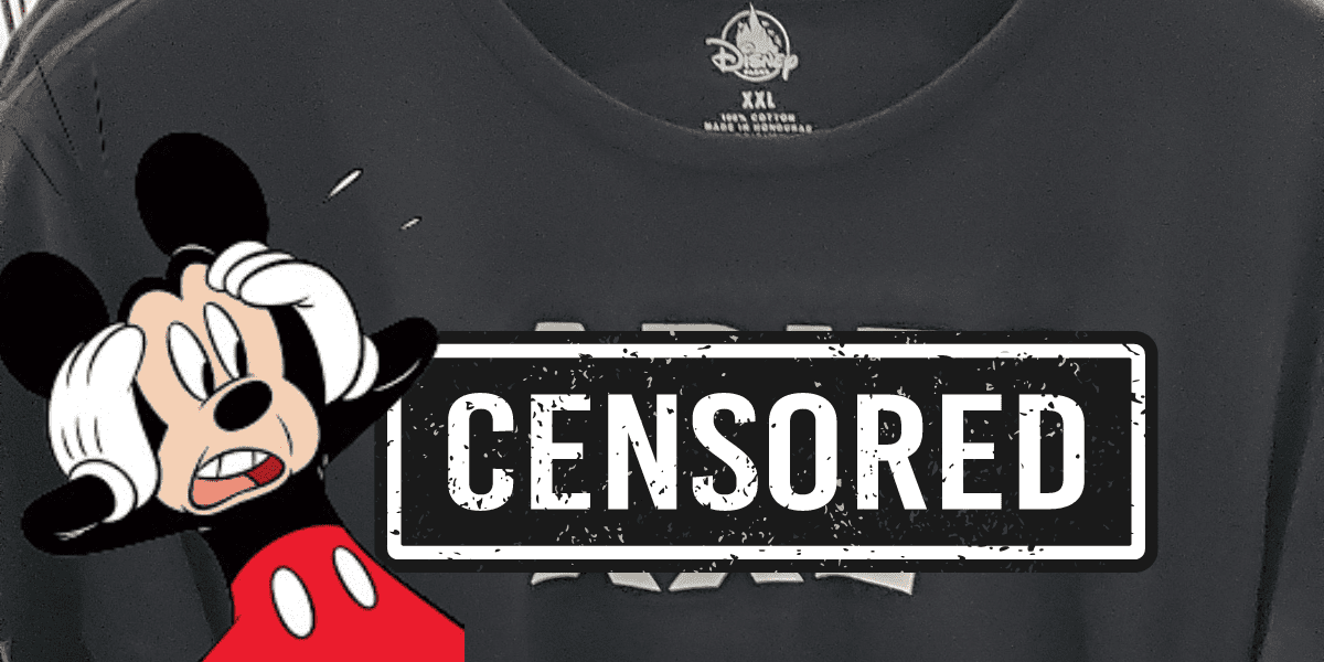 A black Disney shirt. Text on the shirt is covered up with a censored bar and an image of Mickey Mouse looking shocked.