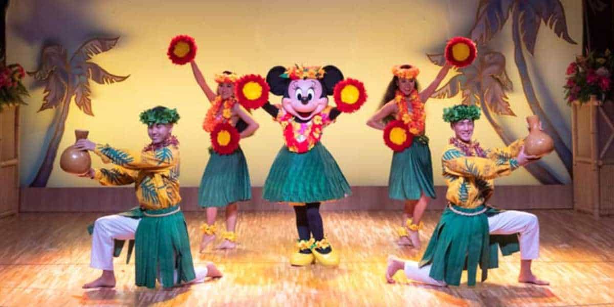 Minnie performing at Mickey's Rainbow Luau Tokyo Disney