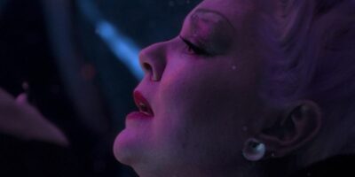 Ursula looks up at Ariel