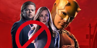 (left to right) Foggy Nelson (Elden Henson), Karen Page (Deborah Ann Woll), Daredevil/Matt Murdock (Charlie Cox), edited with red cross over Karen and Foggy