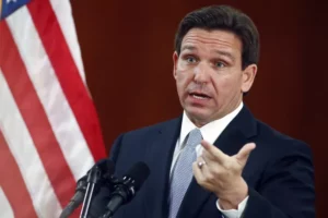 Florida Governor Ron DeSantis pointing concerned