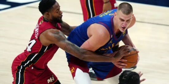 Nikola Jokic battling with the Miami Heat in the first game of the 2023 NBA Finals Bob Iger and ESPN