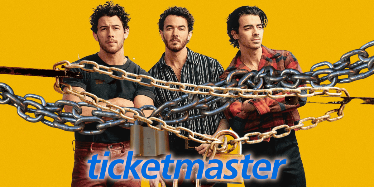 the jonas brothers behind chains with the ticketmaster logo in front of them