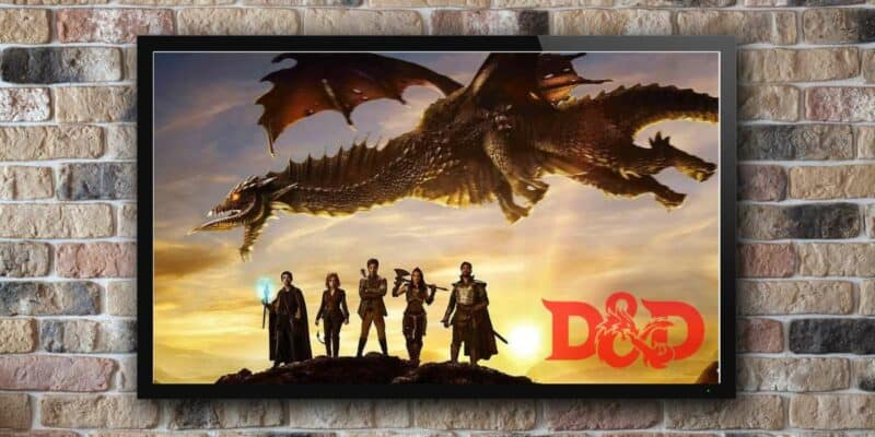 A Dungeons and Dragons image on a television against a brick wall