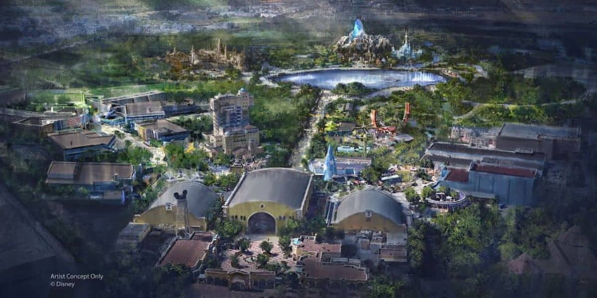 Bird’s-eye view of Disneyland Resort, highlighting new Star Wars: Galaxy’s Edge attractions alongside iconic park buildings, lush gardens, and the blue peak of the Matterhorn overlooking a shimmering lake.