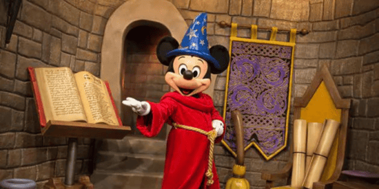 Mickey Mouse in his iconic Fantasia wardrobe