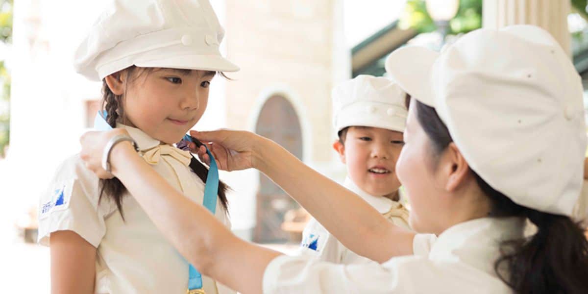 A young child receives their Custodial medal