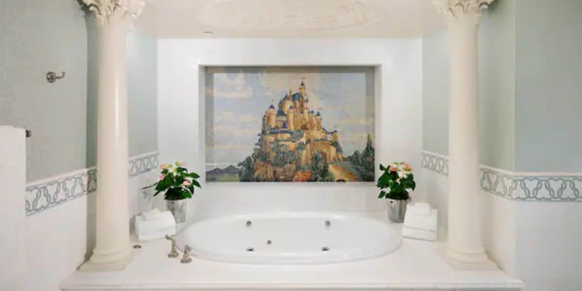 Fairytale Suite's castle mosaic above the bath