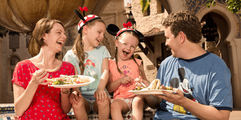 Family enjoying a quick-service meal at Disney World