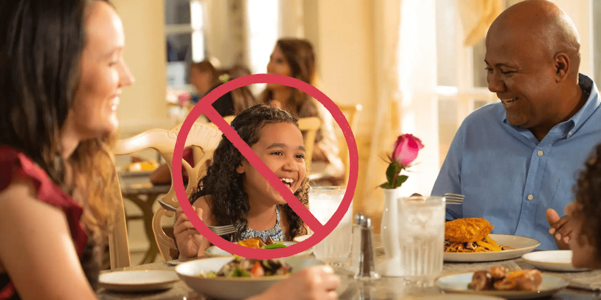 Dining without kids feature image, family dining with no sign over girl