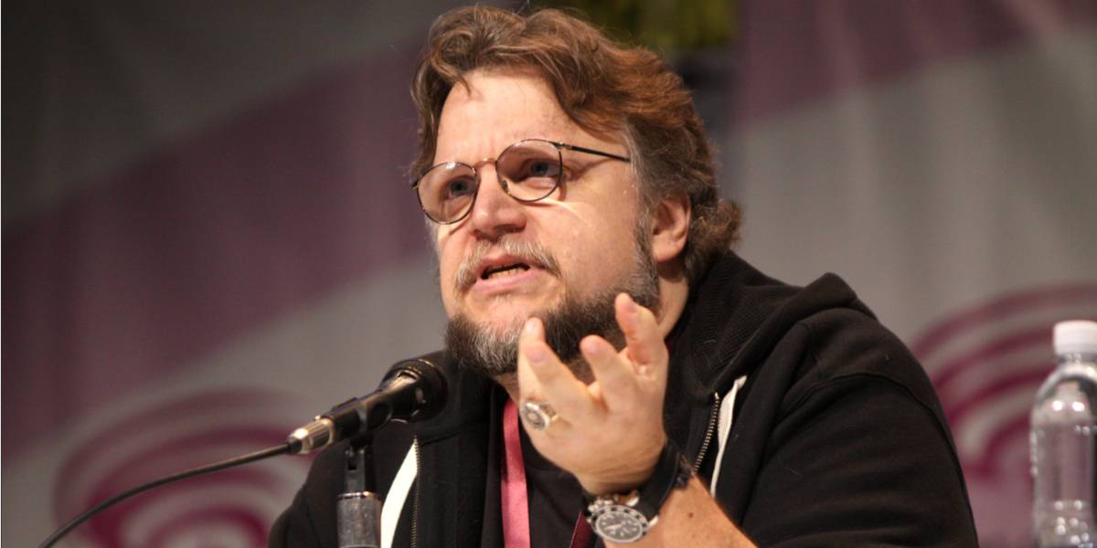 Guillermo del Toro speaking seriously at a panel