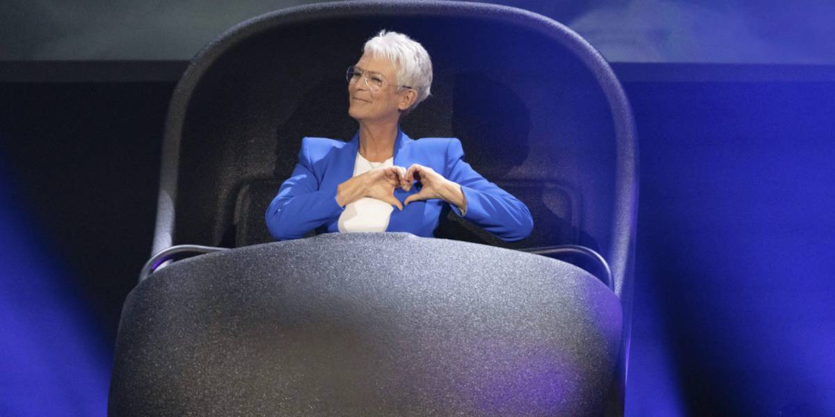 Jamie Lee Curtis in a Doom Buggy at D23 to announce Haunted Mansion