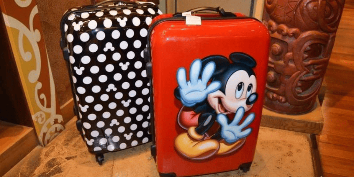 Two Disney-themed suitcases