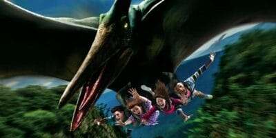 Guests ride Flying Dinosaur