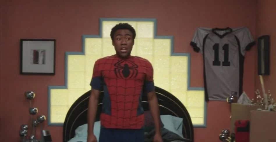 Donald Glover in 'Community,' shown wearing Spider-Man pajamas