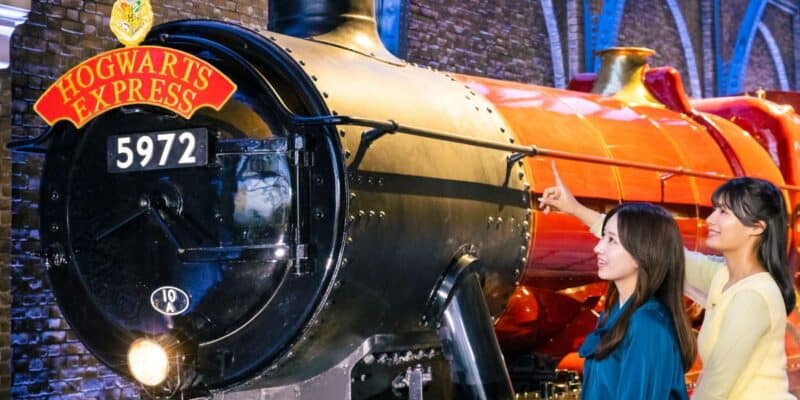 Guests stare at the Hogwarts Express at Warner Bros. Studio Tour Tokyo