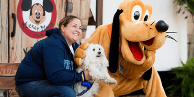 Pluto with girl and her dog