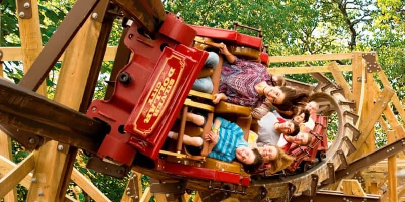 Guests ride a roller coaster at Silver Dollar City