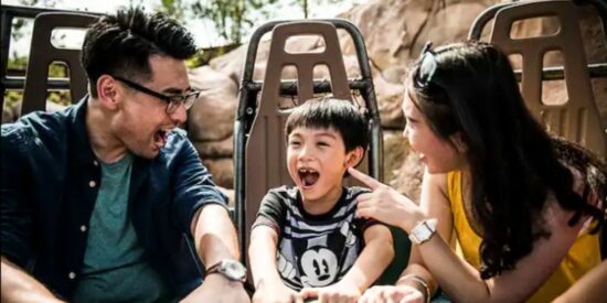 Family enjoying a ride before Shanghai Disneyland bans wagons | Credit: Disney